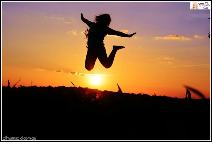 live free lady jumping high in the air with sunset | word for 2017