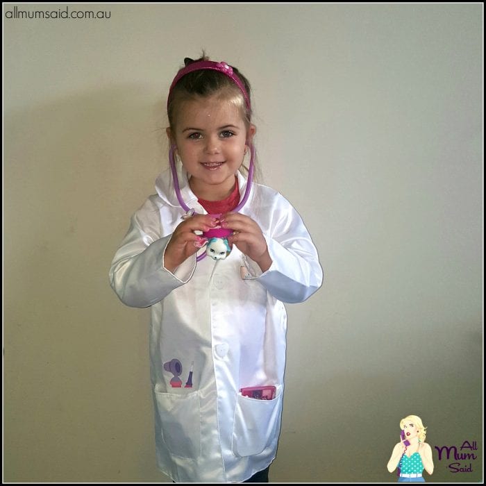 Cute preschool girl in Doc McStuffins costume