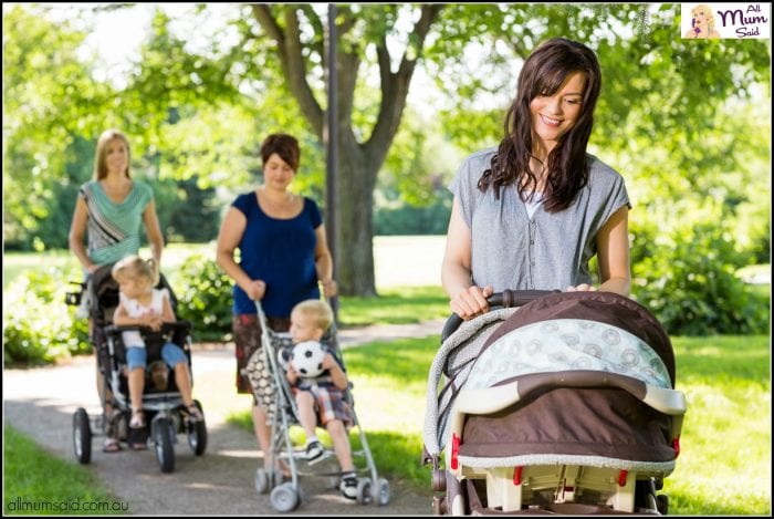 mums walking kids in prams at park | performative parent